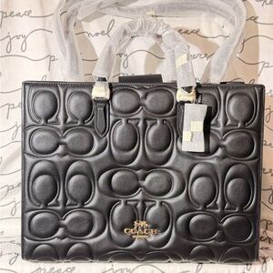 Coach Maggie Tote bag (LARGE) black gold hardware embossed signature pattern.